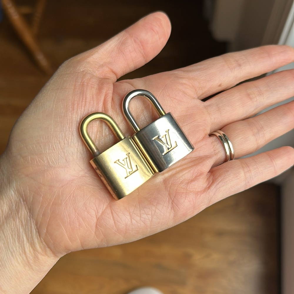 Louis Vuitton silver lock only.